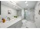 Bright bathroom with modern fixtures, a large mirror, and a walk-in shower with a glass door at 75 14Th Ne St # 3830, Atlanta, GA 30309