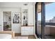 Bedroom area featuring built-in storage and sliding glass doors to a balcony with city views at 75 14Th Ne St # 3830, Atlanta, GA 30309