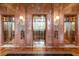 Three elegant elevators with luxurious marble wall panels offer easy access to building floors at 75 14Th Ne St # 3830, Atlanta, GA 30309