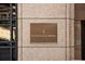 Close-up of the Four Seasons Hotel sign on a marble wall, showcasing its brand identity at 75 14Th Ne St # 3830, Atlanta, GA 30309