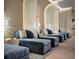 Stylish spa lounge with plush chaise lounges, elegant lighting, and sheer curtains for a calming ambiance at 75 14Th Ne St # 3830, Atlanta, GA 30309