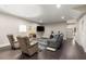 Finished basement featuring comfortable seating, a fireplace, and a television, providing ample space to relax at 103 Birch St, Decatur, GA 30030