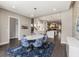 Elegant dining area with a marble table, designer chairs, and contemporary accents at 103 Birch St, Decatur, GA 30030