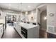 Gourmet kitchen featuring a large island, stainless steel appliances, and modern pendant lighting at 103 Birch St, Decatur, GA 30030