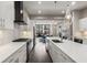 Bright kitchen features white cabinetry, stainless steel appliances, and modern lighting at 103 Birch St, Decatur, GA 30030