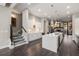 Contemporary kitchen featuring white cabinets, a quartz island, hardwood floors, and stainless appliances at 103 Birch St, Decatur, GA 30030