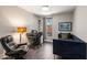Well-lit home office with hardwood floors, a comfortable chair, and natural light from a large window at 103 Birch St, Decatur, GA 30030
