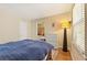 Comfortable bedroom showcasing natural light, hardwood floors, and closet space at 1277 Mcpherson Se Ave, Atlanta, GA 30316