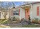 Charming home featuring a quaint entrance, walkway, and well-manicured landscaping at 1277 Mcpherson Se Ave, Atlanta, GA 30316