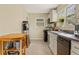 Functional kitchen features appliances, cabinetry, and space for meal preparation at 1277 Mcpherson Se Ave, Atlanta, GA 30316