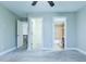 Bedroom with plush neutral carpet, with en-suite bathroom and closet at 912 Fire Thorn Dr, Hampton, GA 30228
