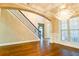 Inviting entryway with dark wood floors and a grand staircase leading to the upper level at 912 Fire Thorn Dr, Hampton, GA 30228