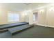 Spacious carpeted room with bright recessed lighting and neutral paint at 912 Fire Thorn Dr, Hampton, GA 30228