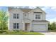 Charming two-story home with brick and siding exterior and well-manicured lawn at 217 Groveton Ct, Euharlee, GA 30145