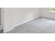 Well-lit bedroom with gray carpeting and a large window, ideal for relaxing at 313 Skye Ln # 49, Cartersville, GA 30121