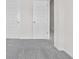 Bedroom with plush carpeting and an open doorway with multiple doors at 313 Skye Ln # 49, Cartersville, GA 30121