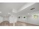 Finished basement area with recessed lights and wood-look flooring; note the drop ceiling at 3951 Covered Bridge Sw Rd, Smyrna, GA 30082