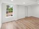 Finished basement includes wood-look floors, natural light from the window and access to backyard at 3951 Covered Bridge Sw Rd, Smyrna, GA 30082