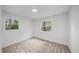 Bright bedroom features neutral carpet, two windows with backyard views and is move-in ready at 3951 Covered Bridge Sw Rd, Smyrna, GA 30082