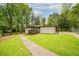 Charming single-story home with a well-manicured lawn and inviting front porch at 3951 Covered Bridge Sw Rd, Smyrna, GA 30082