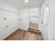 Bright mudroom with vinyl floors, washer/dryer hookups and door to the main house at 3951 Covered Bridge Sw Rd, Smyrna, GA 30082