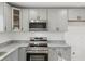 Close up on kitchen featuring stainless appliances and granite countertops at 4179 Hanes Dr, Decatur, GA 30035