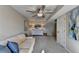 Spacious basement featuring a ceiling fan, neutral tones, and natural light at 7115 Harbour Lndg, Alpharetta, GA 30005