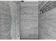 Modern bathroom showcases sleek gray tiling in the shower, creating a clean and contemporary design at 7115 Harbour Lndg, Alpharetta, GA 30005