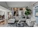 Open-concept living room with hardwood floors and great natural light, perfect for entertaining at 7115 Harbour Lndg, Alpharetta, GA 30005