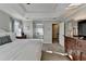 Spacious main bedroom with a trey ceiling, lots of natural light and an ensuite bathroom at 7115 Harbour Lndg, Alpharetta, GA 30005