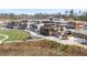 Beautiful aerial view of the community's shopping center with outdoor dining and ample parking at 1645 Renfroe Run, Cumming, GA 30041