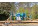 Community playground with slides and play structure for neighborhood children to enjoy at 1645 Renfroe Run, Cumming, GA 30041