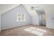 The bedroom is bright with two large windows, neutral carpet, and a light blue painted wall at 3655 Autumn Ridge Pkwy, Marietta, GA 30066