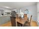 Cozy dining area with table set for four, adjacent to the kitchen, bathed in natural light at 3655 Autumn Ridge Pkwy, Marietta, GA 30066