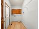 Laundry room with wood look floors, cabinets and white walls at 3655 Autumn Ridge Pkwy, Marietta, GA 30066