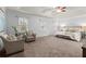 Spacious main bedroom with sitting area, carpet flooring, tray ceilings and great natural light at 3655 Autumn Ridge Pkwy, Marietta, GA 30066