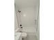 Bright bathroom with white subway tile, black accents, and a tiled shower with tub at 4430 Locksley Rd, Tucker, GA 30084
