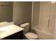 A clean bathroom featuring a shower and vanity with sink at 849 Arbor Crowne Dr, Lawrenceville, GA 30045