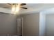 Bright bedroom with ceiling fan at 849 Arbor Crowne Dr, Lawrenceville, GA 30045