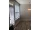 Bright dining nook with a window and a contemporary light fixture at 849 Arbor Crowne Dr, Lawrenceville, GA 30045