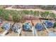 A bird's eye view shows homes with backyard pools bordering the manicured lawns of a golf course at 151 Creek Bank Dr, Acworth, GA 30101
