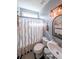 Charming bathroom featuring vintage lighting, and a white vanity with stylish decor at 151 Creek Bank Dr, Acworth, GA 30101
