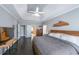 Lovely bedroom features hardwood floors, a tray ceiling, and lots of natural light at 151 Creek Bank Dr, Acworth, GA 30101