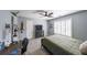 A secondary bedroom featuring plantation shutters, a ceiling fan, and unique decor at 151 Creek Bank Dr, Acworth, GA 30101