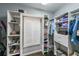 Custom walk-in closet with ample shelving and hanging space at 151 Creek Bank Dr, Acworth, GA 30101