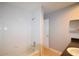 Bathroom with shower/tub combo and vanity with white tiled walls at 3301 Henderson Mill Rd # F1, Atlanta, GA 30341