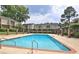 Inviting pool with brick trim, perfect for relaxing and enjoying sunny days at 3301 Henderson Mill Rd # F1, Atlanta, GA 30341