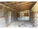Spacious shed with wood beams ready for storage or workshop conversion at 5205 Dunmoreland Ct, Atlanta, GA 30349