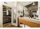 Elegant bathroom features a walk-in closet, vanity with a large mirror, and modern fixtures adding a touch of luxury at 170 Boulevard Se # H523, Atlanta, GA 30312