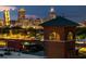Nighttime cityscape with illuminated buildings, railways, and a brick structure at 170 Boulevard Se # H523, Atlanta, GA 30312